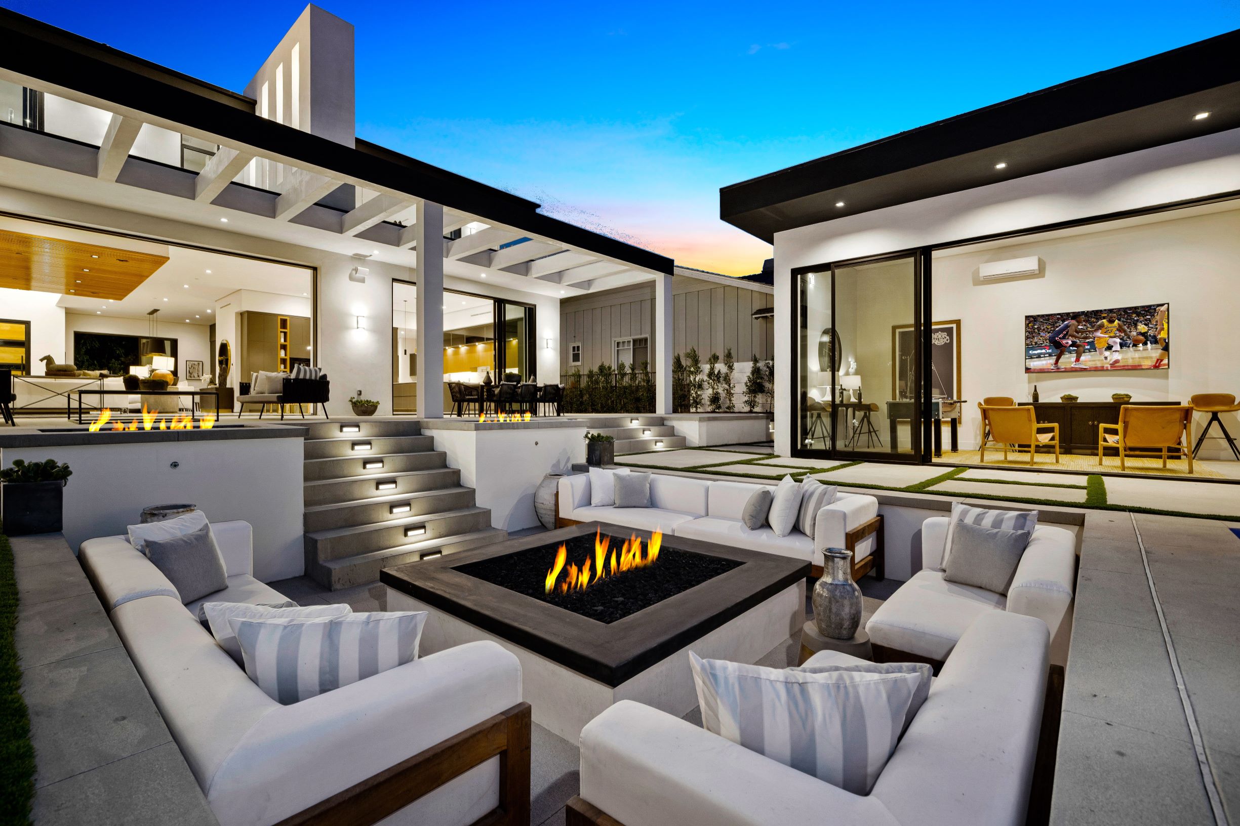 Backyard with open multi-slide aluminum doors.