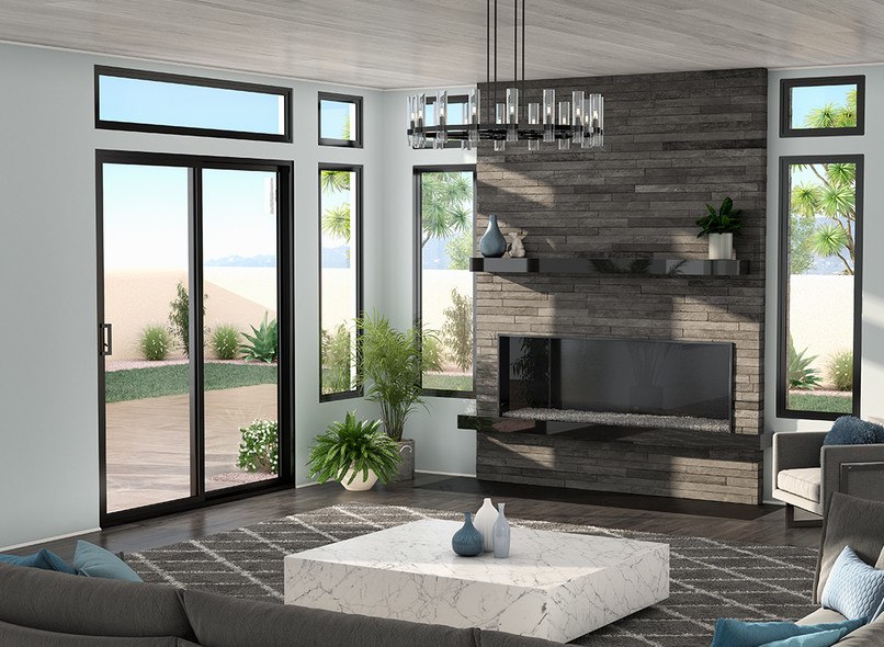 A modern gray and white living room with black Trinsic Milgard windows and a black framed sliding glass door. 