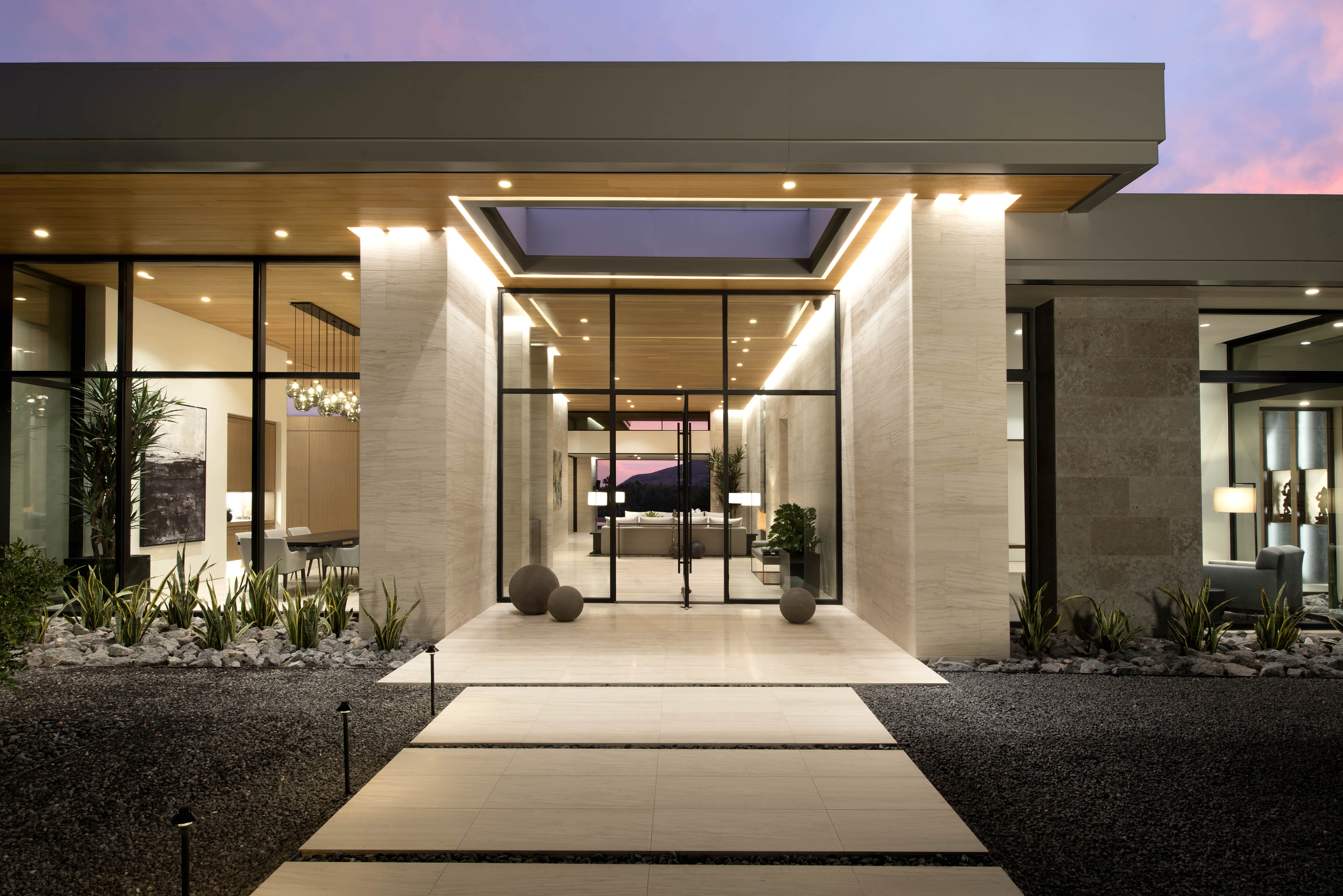 Modern home with large Pivot front door.