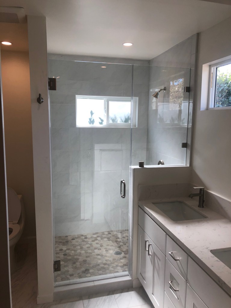 Custom cut glass shower door to fit countertop