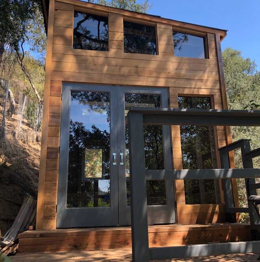 Guest house exterior with diagonal trapezoid windows
