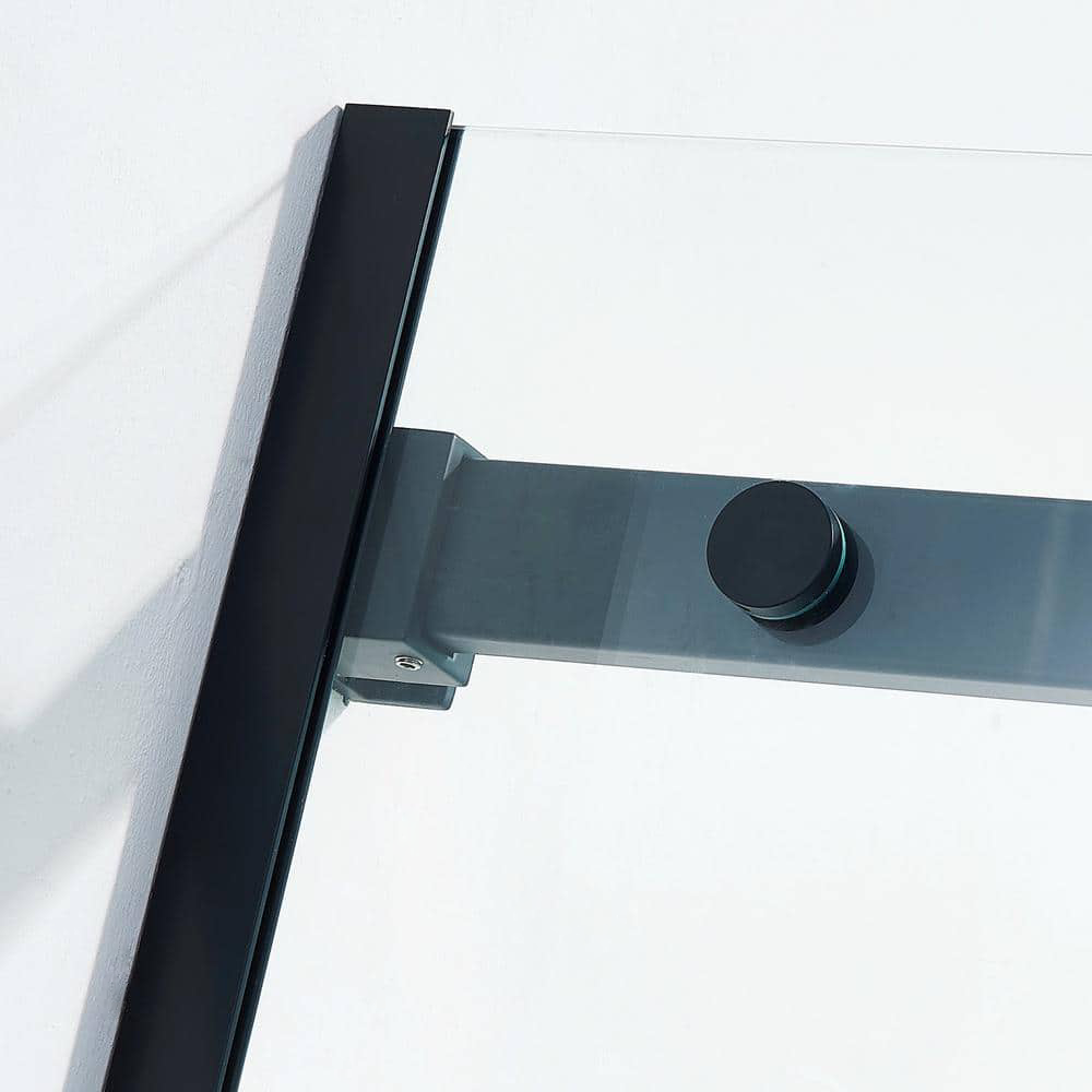 Top left of single sliding shower set with matte black hardware and narrow wall profile