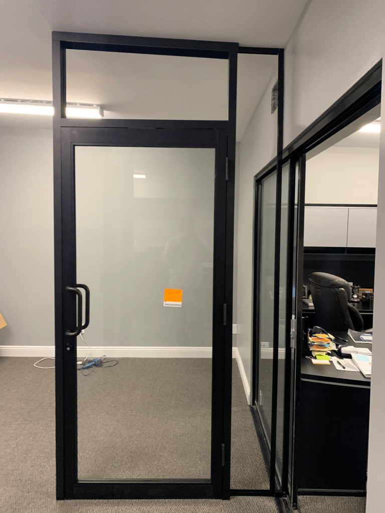Interior glass office enclosure